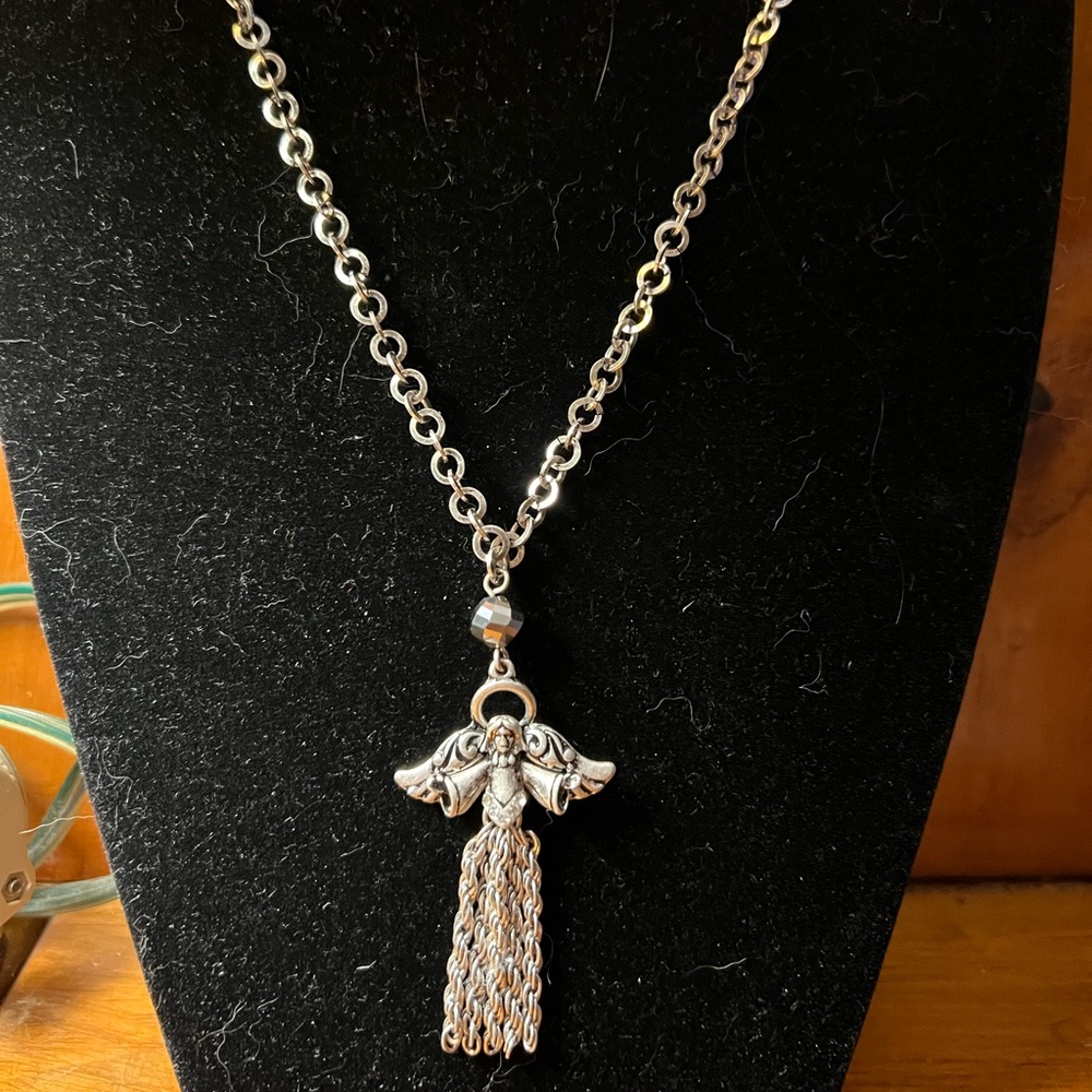 JS Silver tone necklace with Angel pendant